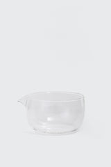 Clear glass matcha bowl for mixing by Matcha Ready, with a smooth curved shape and wide open top for easy whisking.