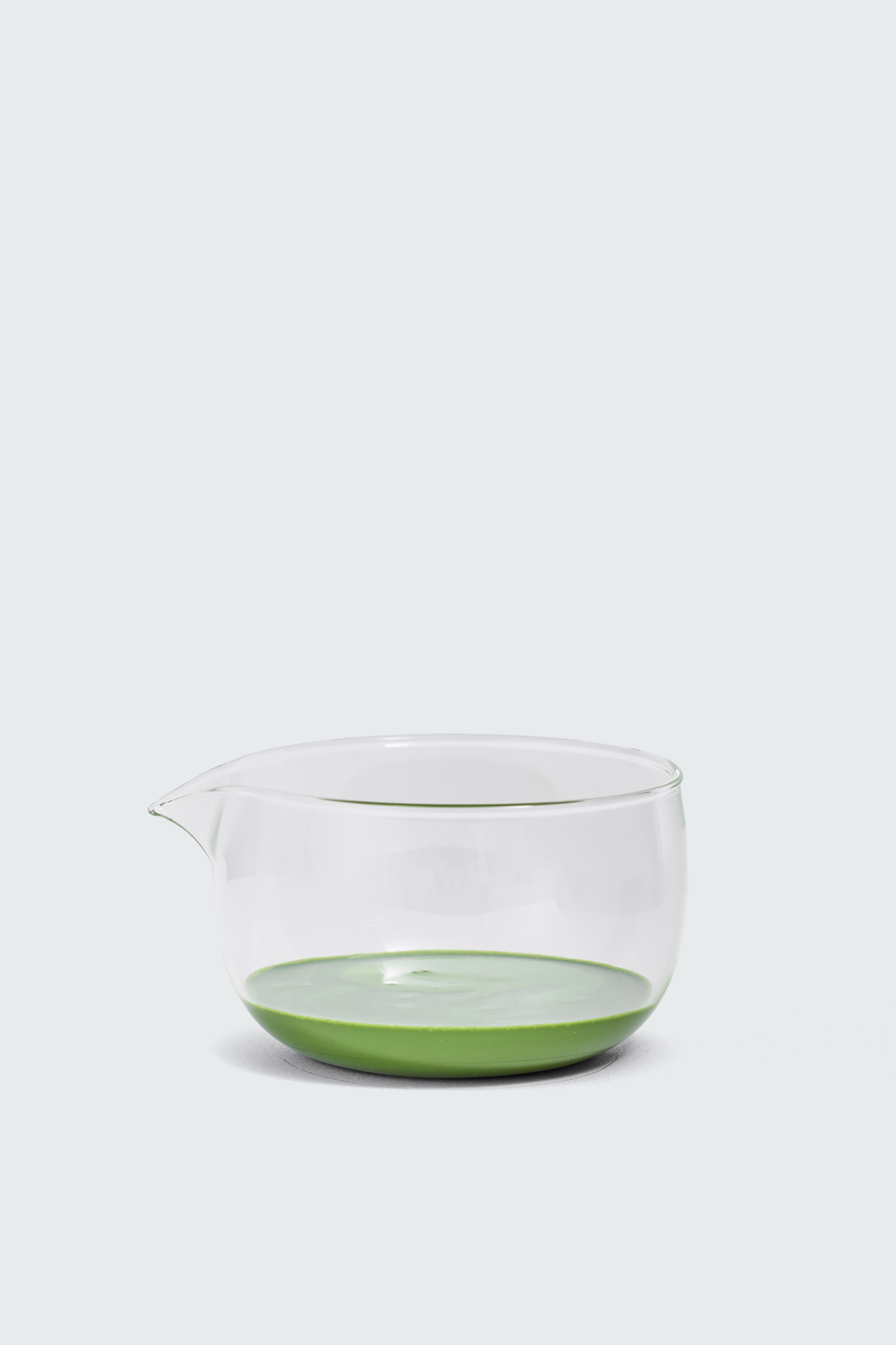 Clear glass matcha bowl for mixing by Matcha Ready, featuring a smooth, rounded design ideal for preparing tea and beverages.