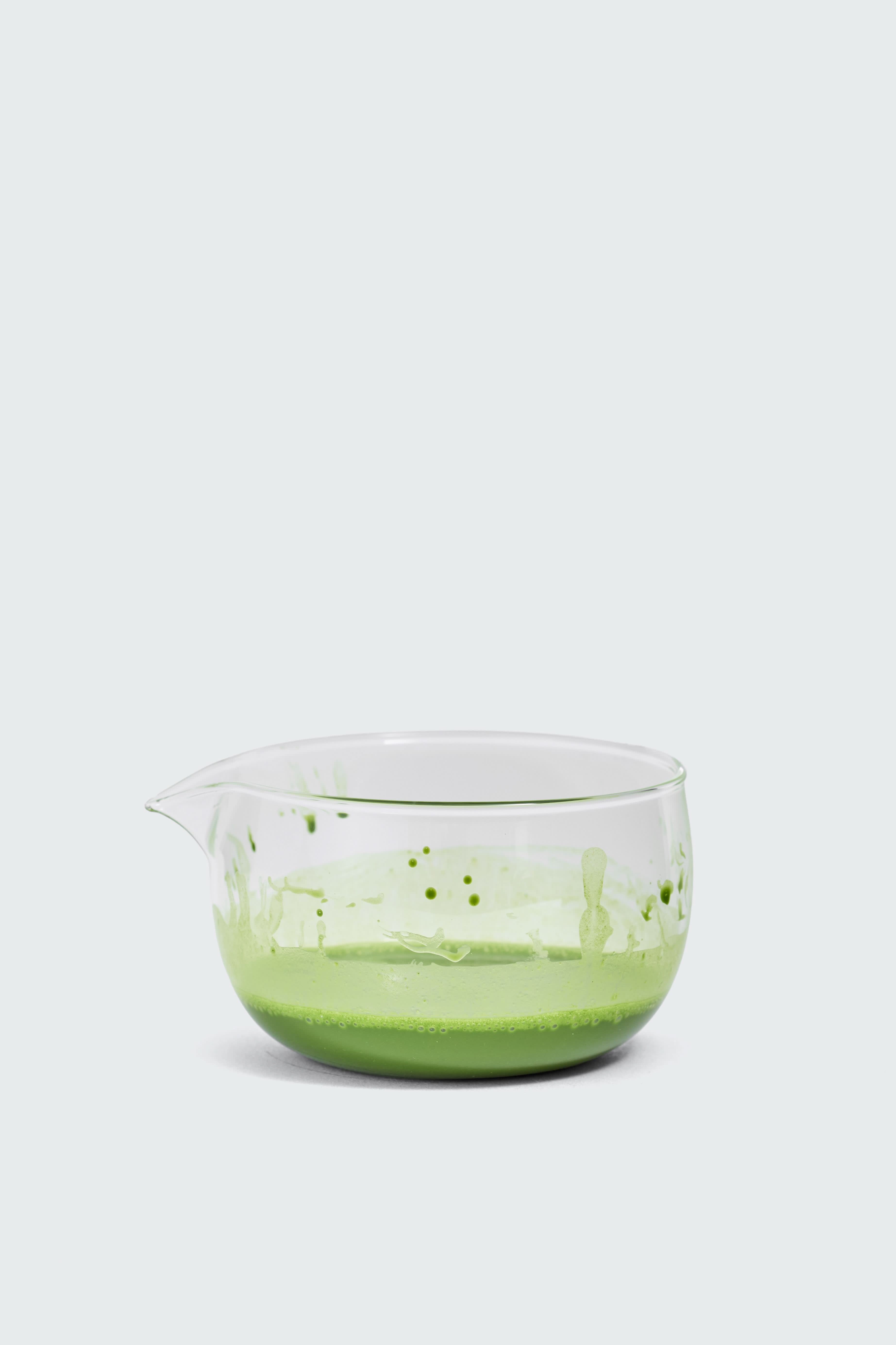 Clear glass matcha bowl for mixing by Matcha Ready, featuring a smooth, rounded design ideal for preparing matcha tea.