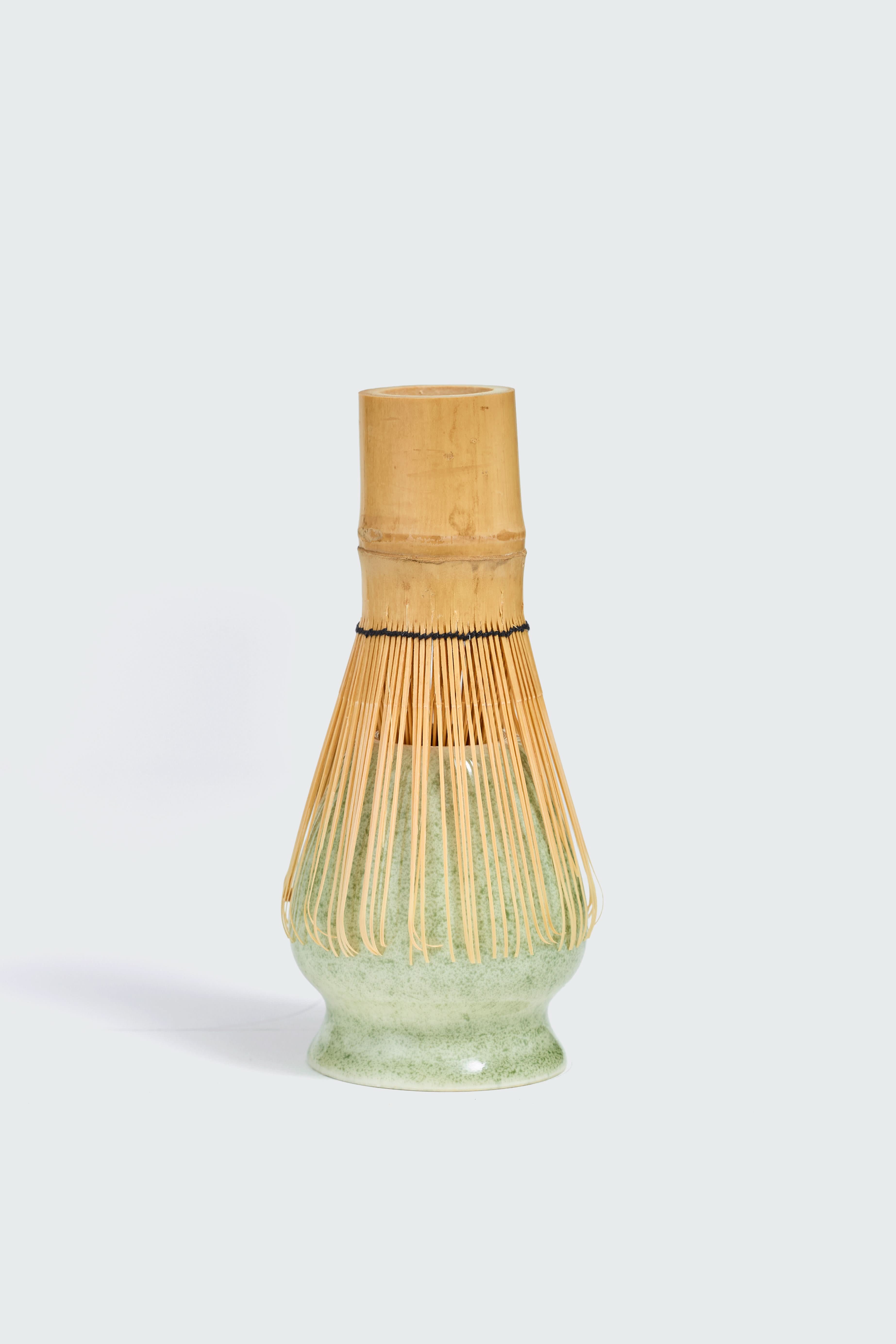 Matcha Ready bamboo matcha whisk holder in mint green, designed to hold and display matcha whisks elegantly.