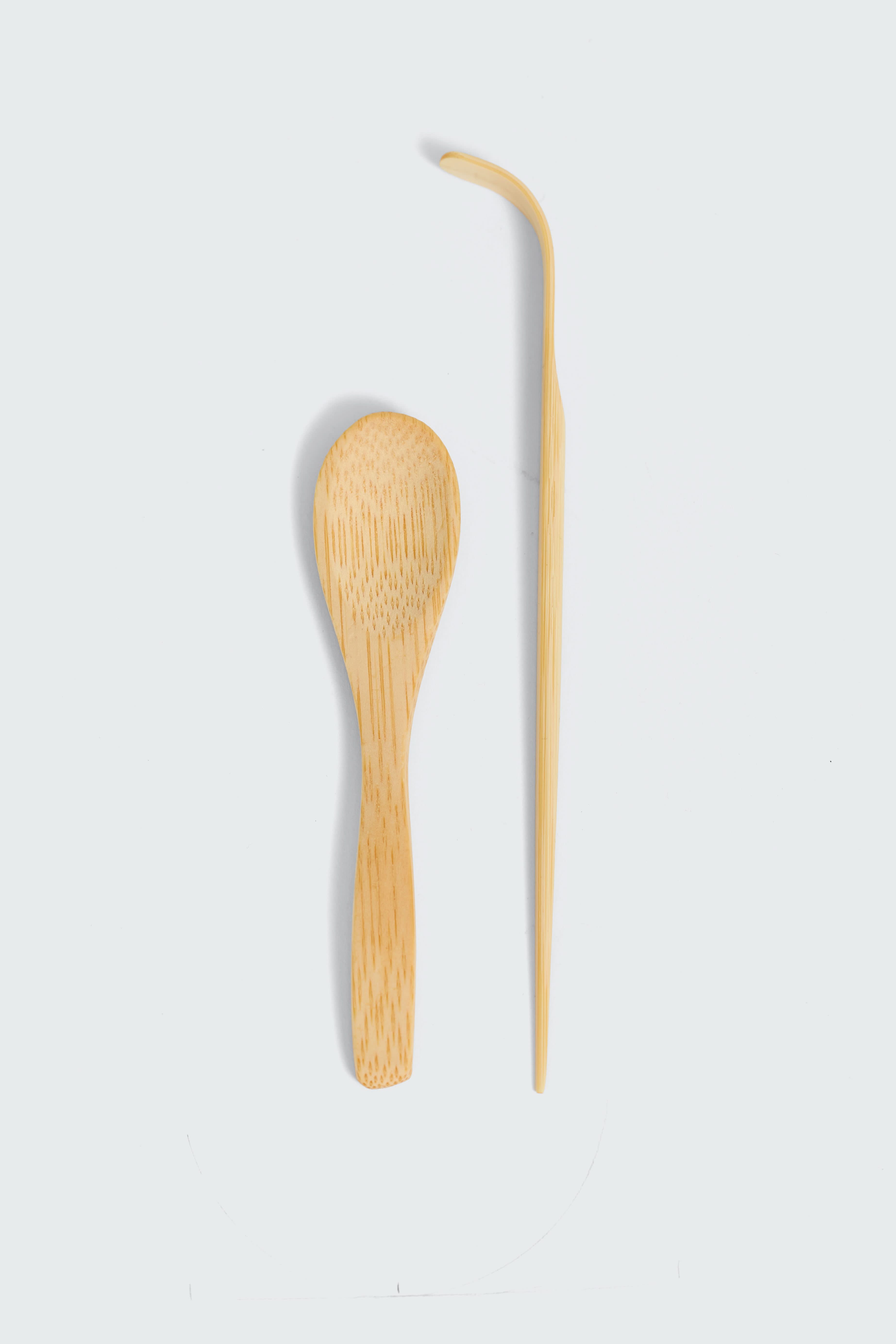 Matcha Ready wooden and classic stainless steel matcha spoons, ideal for measuring and serving matcha tea.