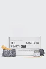 Matcha Ready kit with green matcha powder, bamboo whisk, and bowl for traditional Japanese tea preparation.